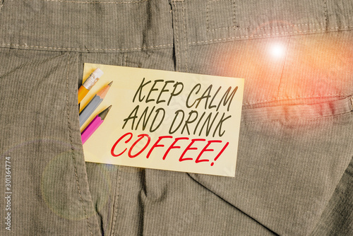 Writing note showing Keep Calm And Drink Coffee. Business concept for encourage demonstrating to enjoy caffeine drink and relax Writing equipment and yellow note paper inside pocket of man trousers