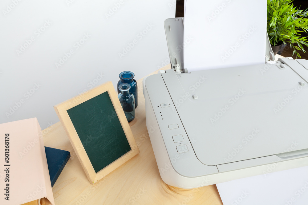 Hands of a woman using a copying machine close up Hands of a woman using a copying machine close up