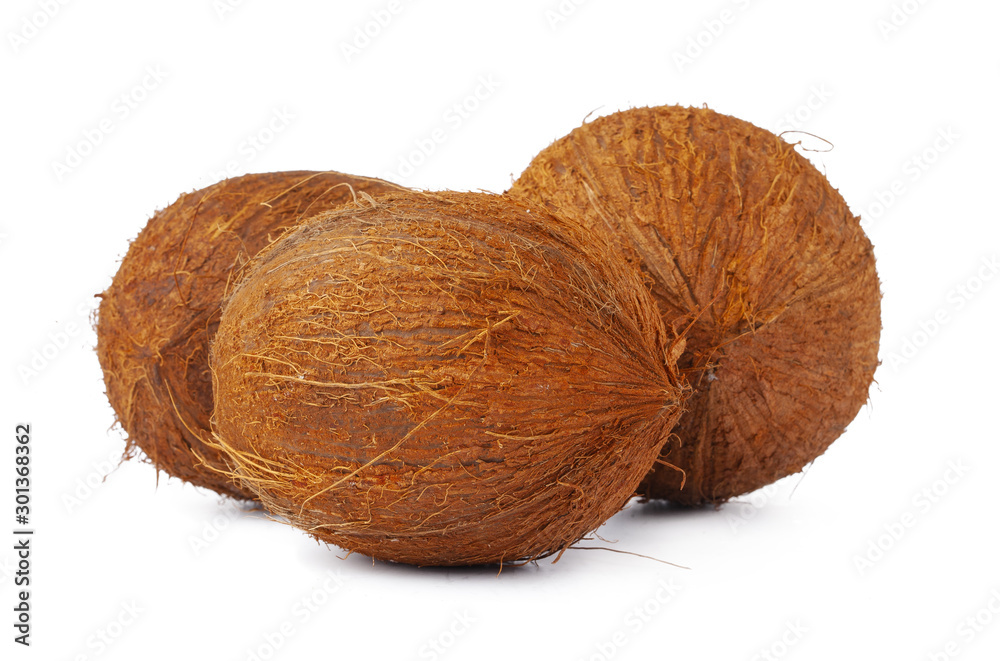 Whole coconut close up isolated on white background Whole coconut close up isolated on white background