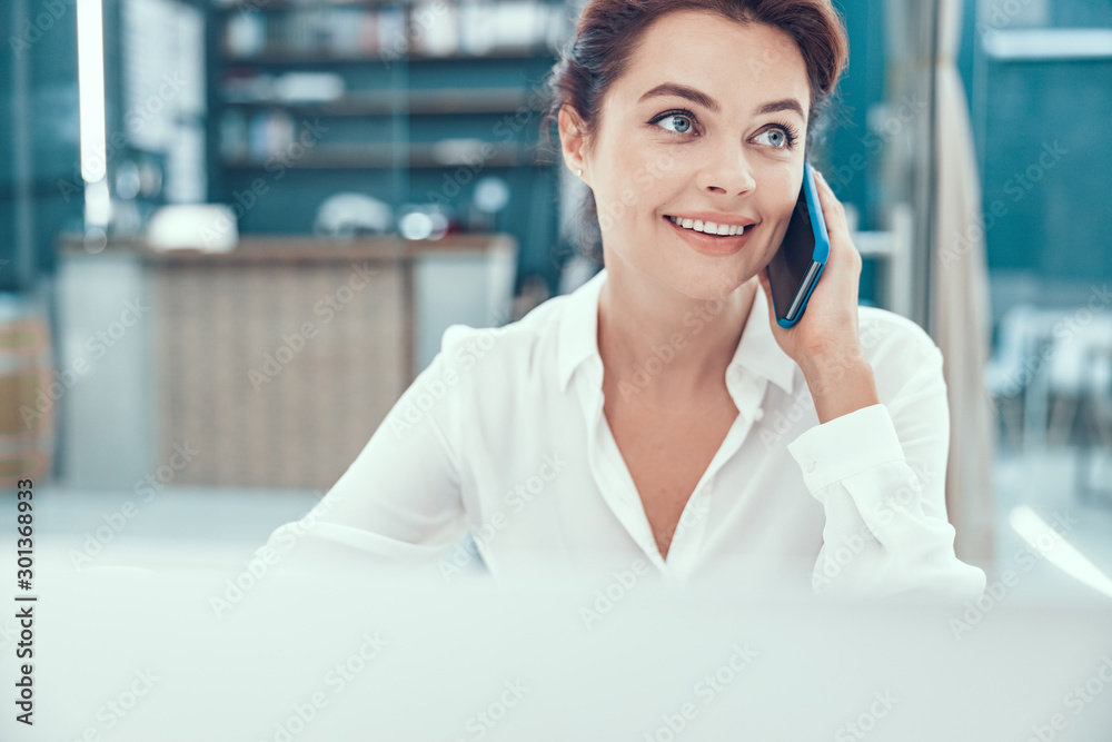 Elegant lady having pleasant phone talk stock photo Elegant lady having pleasant phone talk stock photo