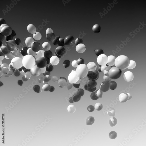 lots of balloons flying in the sky. monochrome, black and white