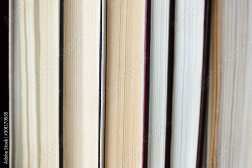 A stack of old books close-up. Educational background