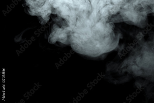 Abstract powder or smoke effect isolated on black background,Out of focus