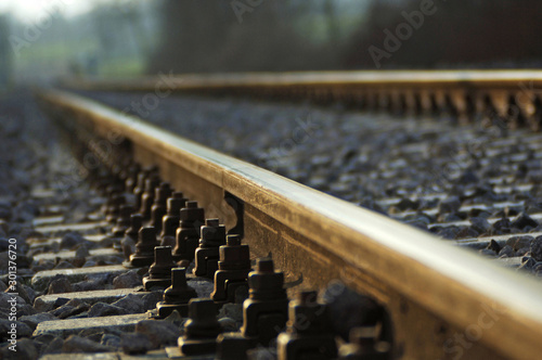 railway track concept: close-up view of traditional train rails