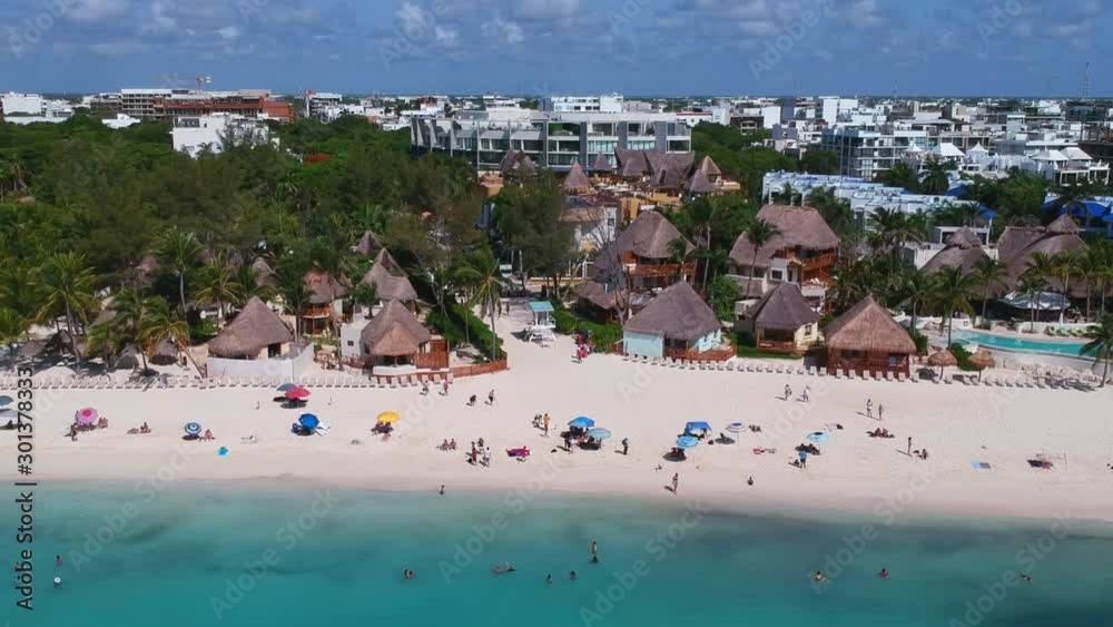 Flight to the beach, palm trees, bungalows in Mexico Flight to the beach, palm trees, bungalows in Mexico