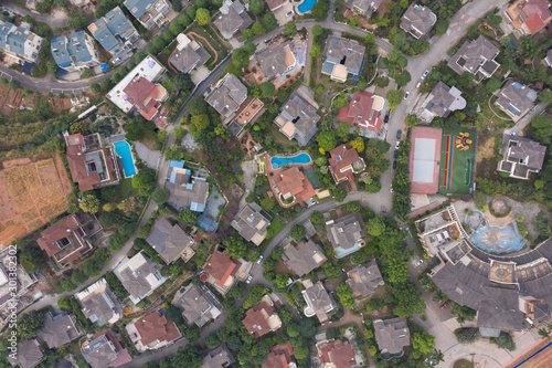 Aerial shot overlooking beautiful town residential colored roof top view