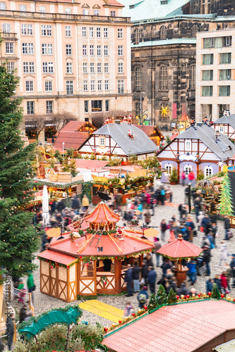 Christmas market with different stalls and tree
