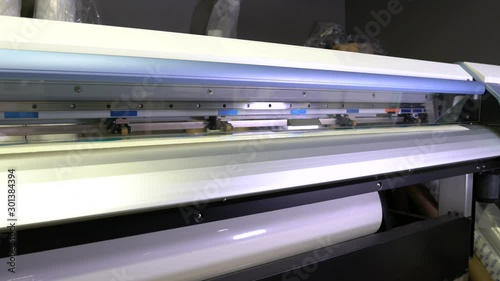 Wide-format inkjet printer in action 