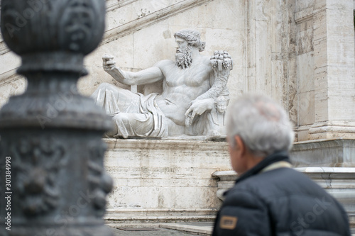 Photography Statua of god of the river nile in front of the capitoline hill in rome italy
