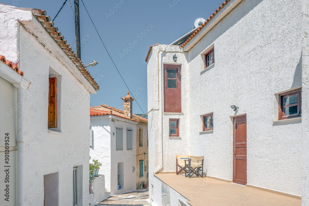 Alley with ouses in the center of Kokkari in Samos, Greece.