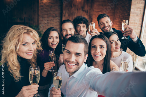 Self-portrait of nice-looking attractive lovely trendy charming cheerful cheery glad people company meeting celebrating festal day at modern industrial brick loft style interior house indoors
