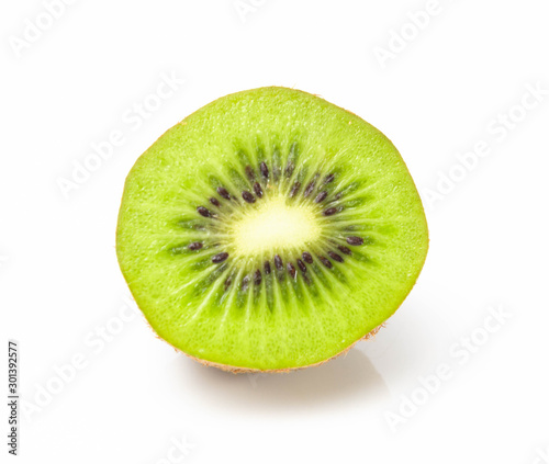 Green kiwi cut in half half on a white background