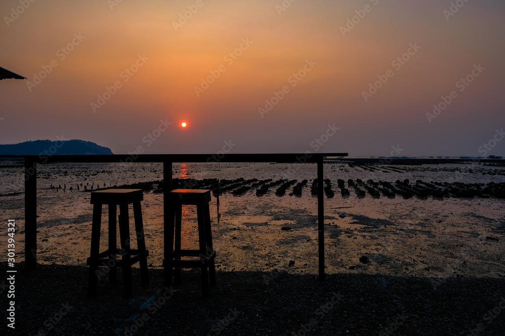 The sun is setting the horizon in the mangrove forest in Pattaya of Thailand.