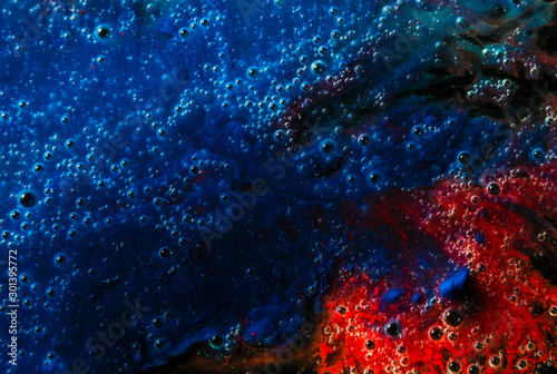 bubble abstract background with dish soap and red blue pigment colors
