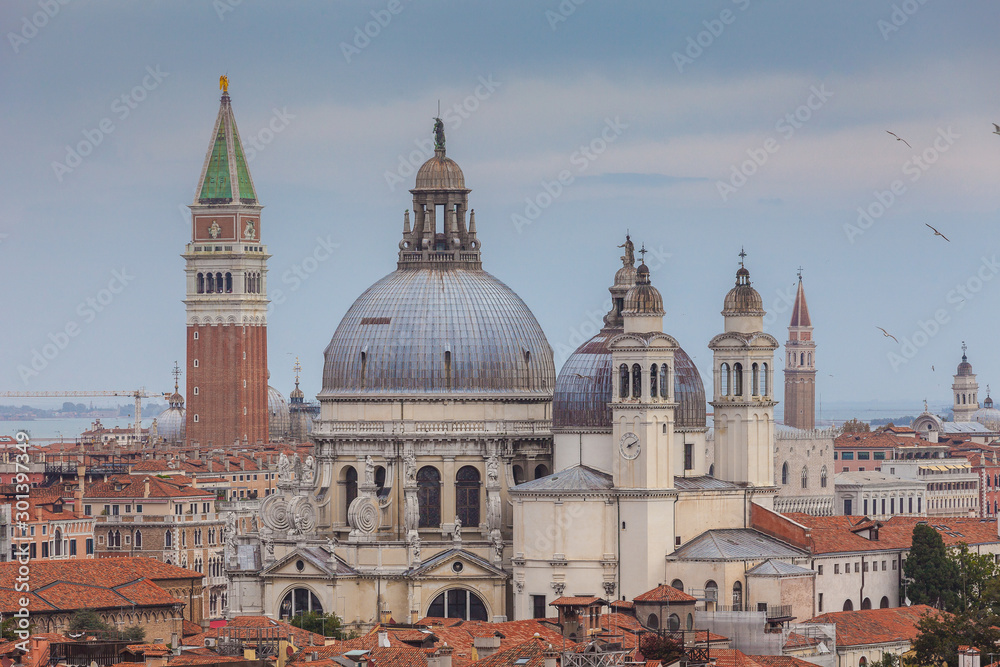Aerial panorama of Basilica della Salute domes and San Marco bell tower, Venice, Italy