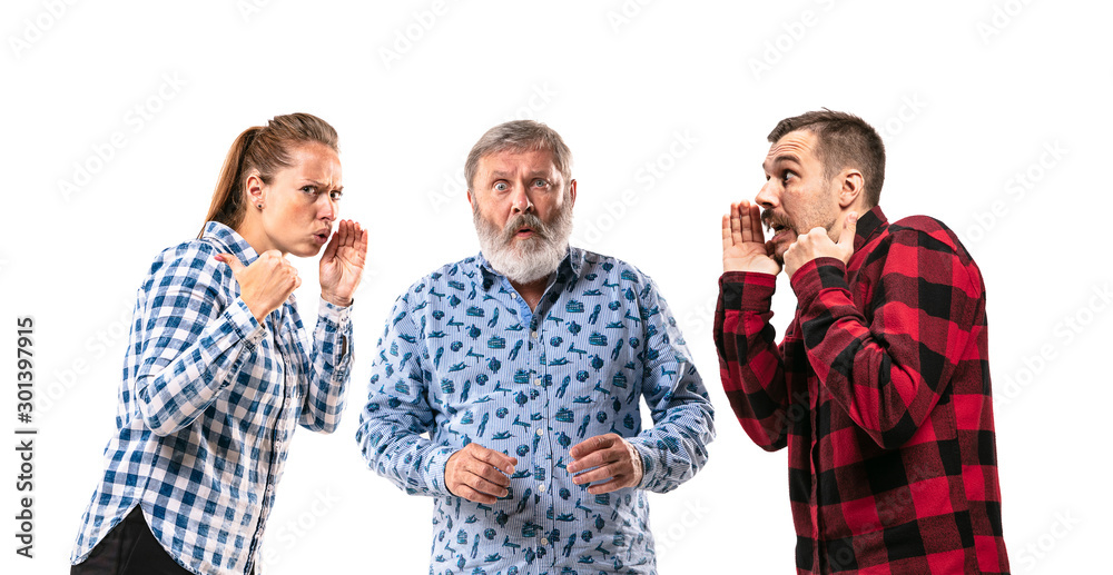 Family members arguing with one another on white studio background. Concept of human emotions, expression, conflict of generations. Woman and men in dispute. Half-length portrait. Copyspace.