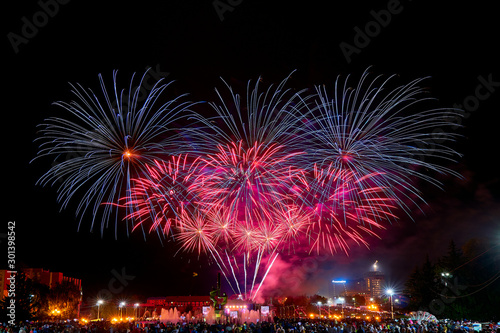 Colorful fireworks in the city. Festive fireworks. © Ramil Gibadullin