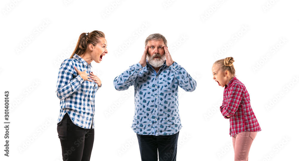 Family members arguing with one another on white studio background. Concept of human emotions, expression, conflict of generations. Woman, man and little girl. Problem of parents and childrens. Family members arguing with one another on white studio background. Concept of human emotions, expression, conflict of generations. Woman, man and little girl. Problem of parents and childrens.