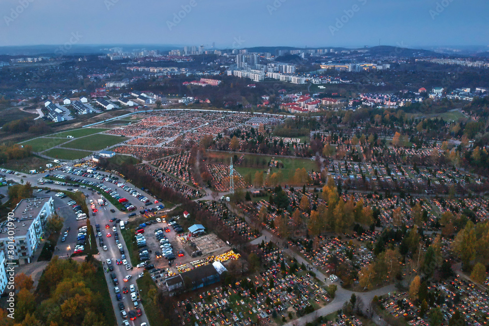 Obraz premium Aerial view of the Lostowicki cemetery in Gdansk at All Saints Day with many candle lights, Poland