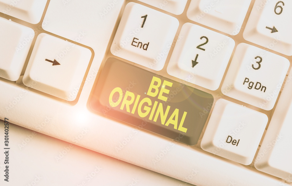 Writing note showing Be Original. Business concept for created directly and demonstratingally by an artist Not a imitation White pc keyboard with note paper above the white background