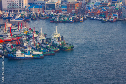 Port, ships off the coast.