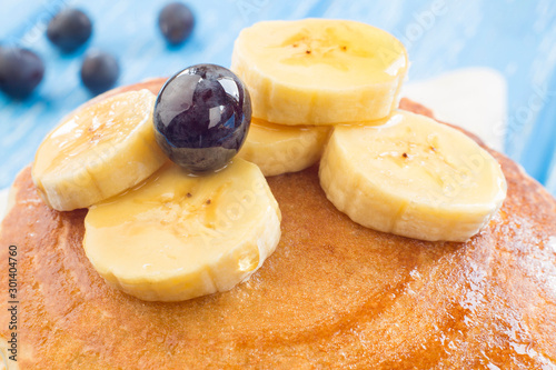 Delicious pancakes with blueberry and bananas