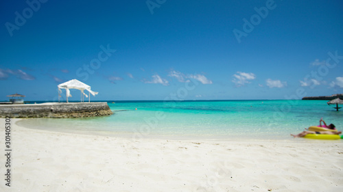 Fototapeta Naklejka Na Ścianę i Meble -  Maldives white sand beach with turquoise water and blue sky