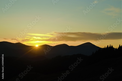 beautiful sunset sky over the peaks © andros1983