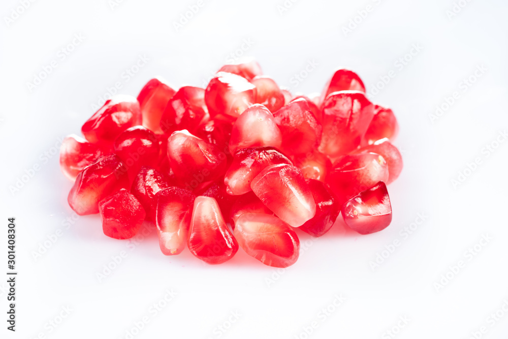 ripe and delicious pomegranate on white ripe and delicious pomegranate on white