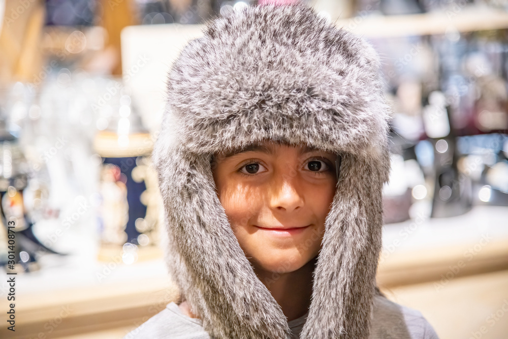Young girl wearing iceland hat with fur Young girl wearing iceland hat with fur