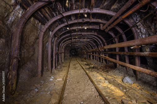 Gold iron mine ore shaft tunnel drift with timbering