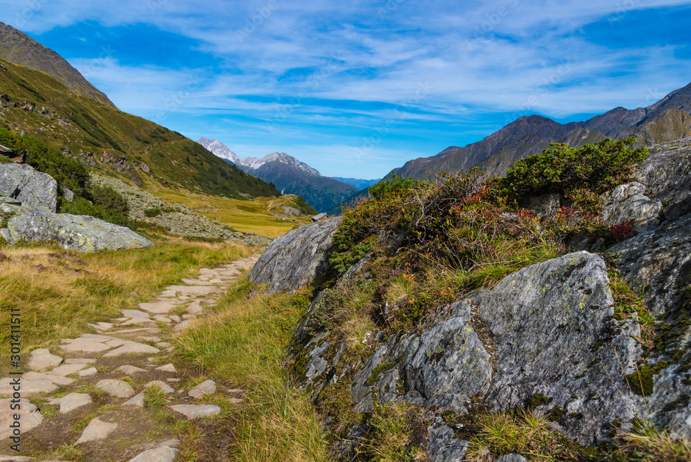 stony path with rock in the stubai alps