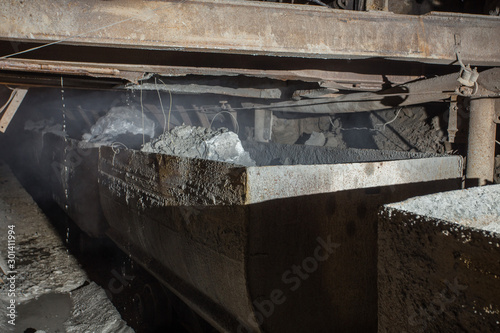 Gold iron mine shaft loading ore to car wagon