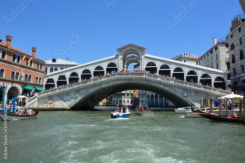 Venice (Italy). June 2019. The two banks of the Grand Canal are connected by the Rialto Bridge. In the XVI century. architect Antonio de Ponte proposed the construction of an arch bridge. 