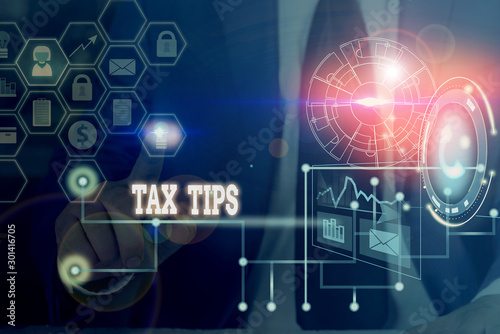 Conceptual hand writing showing Tax Tips. Concept meaning compulsory contribution to state revenue levied by government Picture photo network scheme with modern smart device