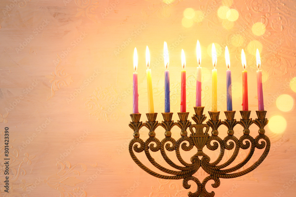 Religion image of jewish holiday Hanukkah background with menorah (traditional candelabra) and candles Religion image of jewish holiday Hanukkah background with menorah (traditional candelabra) and candles