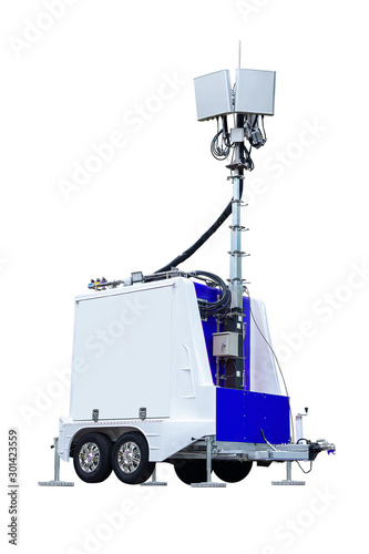 cell on wheels colour white and blue COW mobile cell site with cellular antenna tower and electronic radio transceiver equipment part of a cellular network. on isolated.