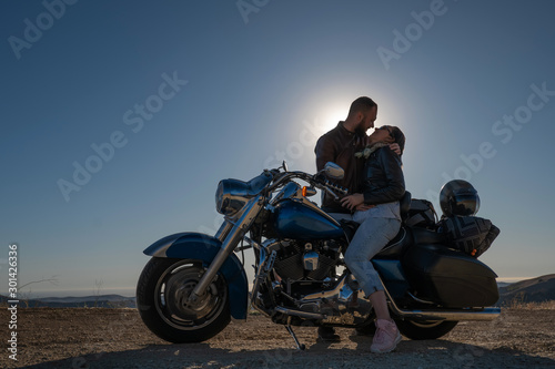 Couple in love and motorcycle