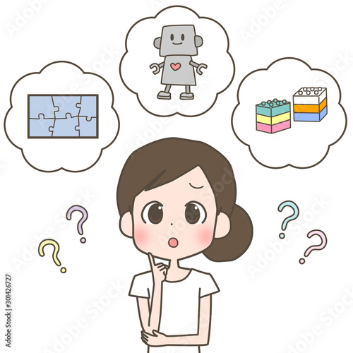 おもちゃ選びに悩む女性