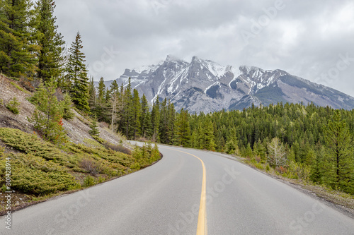 Scenic mountain view with roadway on Bow Valley Parkway in Banff, Canada