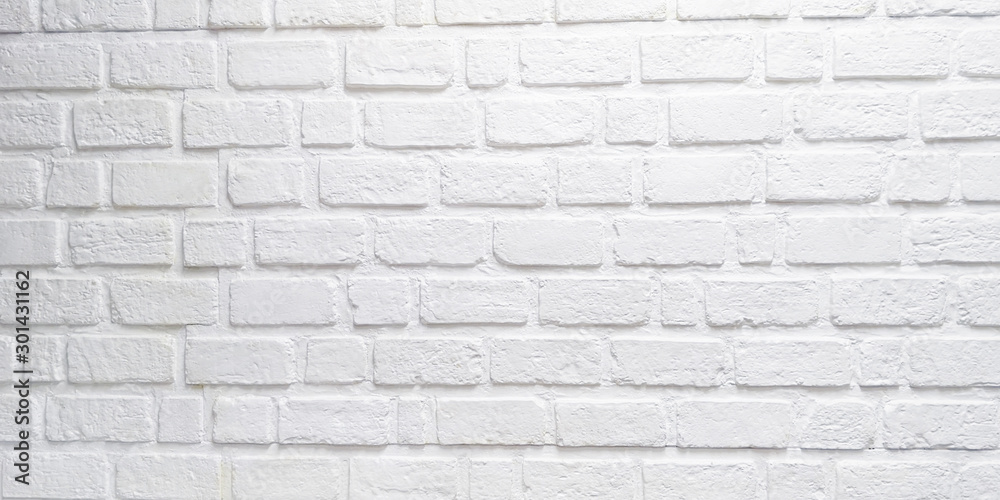 Close up modern white brick tiles wall texture background Close up modern white brick tiles wall texture background