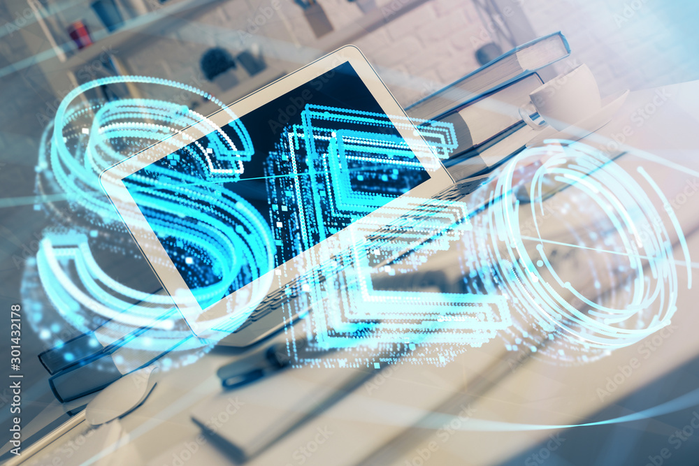 Multi exposure of table with computer and seo drawing hologram. Search optimization concept. Multi exposure of table with computer and seo drawing hologram. Search optimization concept.