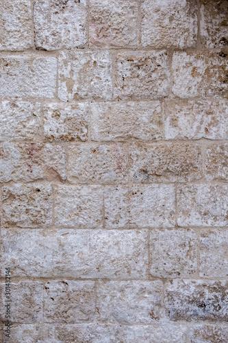 Wall, masonry of stone blocks, fragment. Italy.