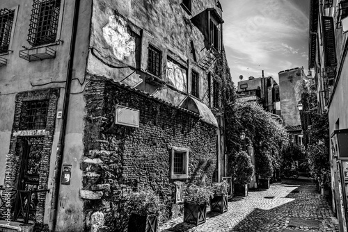 Picturesque alley in Trastevere in black and white