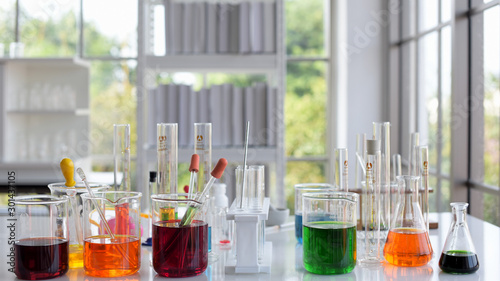 Equipment and science experiments,glass test tubes and flasks with colorful liquid