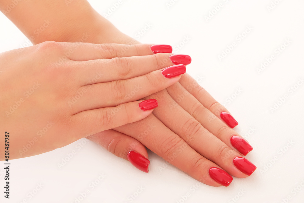 Perfectly done red manicure on studio shoot. Perfectly done red manicure on studio shoot.