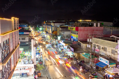 Busy night street in Puerto Princesa, Palawan, Philippines - April 2018.