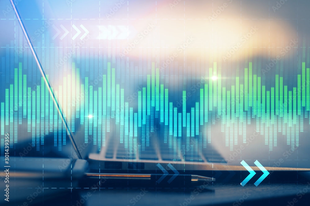 Stock market graph on background with desk and personal computer. Double exposure. Concept of financial analysis. Stock market graph on background with desk and personal computer. Double exposure. Concept of financial analysis.