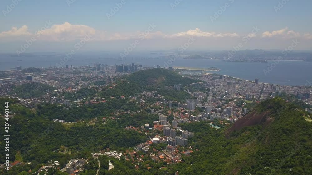 Rio De Janeiro, Brazil Aerial. Flying Above Hills With Stunning View on City and a Coast Rio De Janeiro, Brazil Aerial. Flying Above Hills With Stunning View on City and a Coast