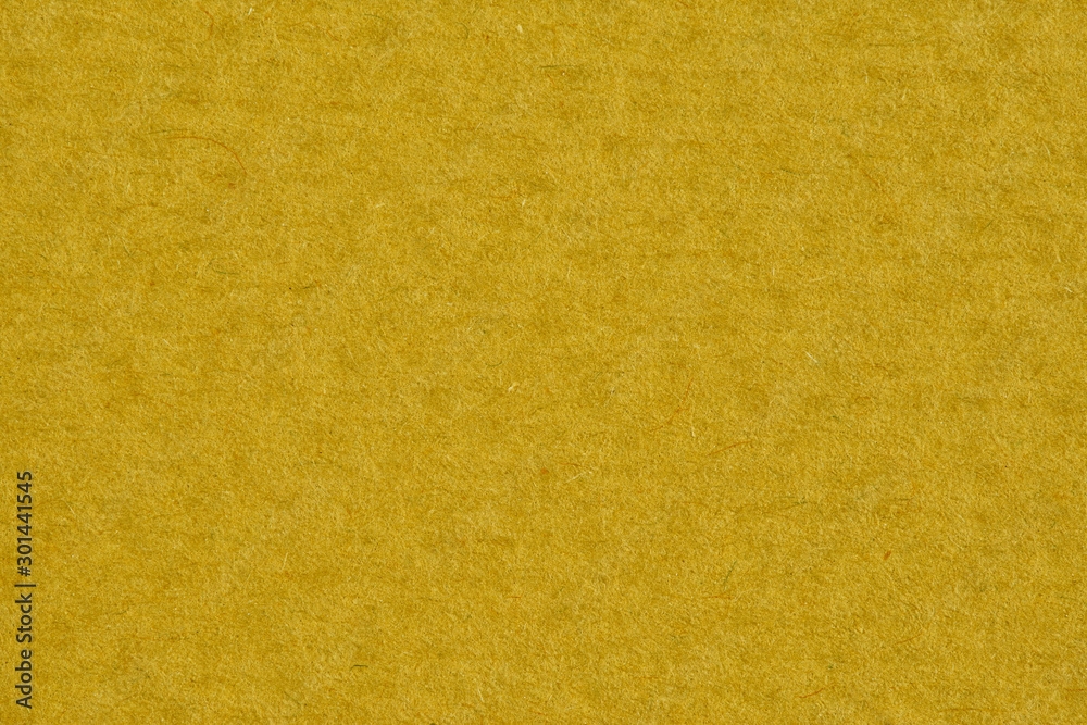 Fototapeta premium Yellow paper with texture pattern for background. Paper for interior and exterior decoration or background for handcrafts. Yellow paper background.